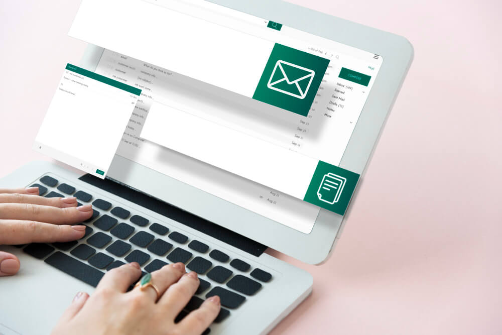 Laptop displaying a simple email newsletter layout for a small business
